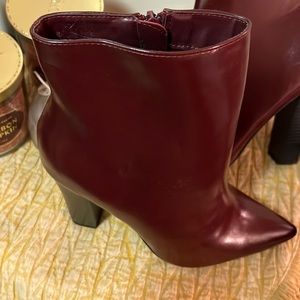 BRAND NEW! Never worn, w/out tags. Burgundy heeled boots in a women’s size 8.5.